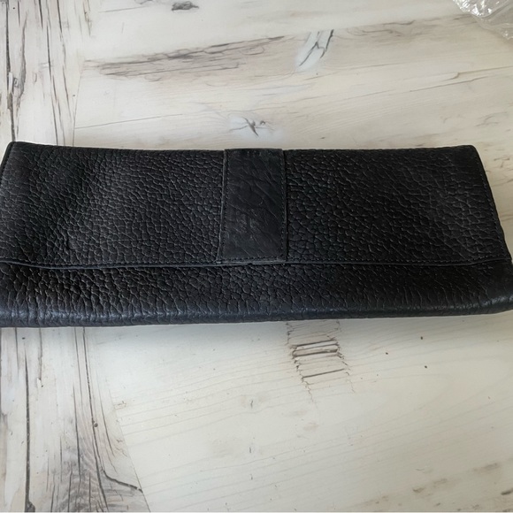 Black pebble leather clutch with studs. - Picture 2 of 2